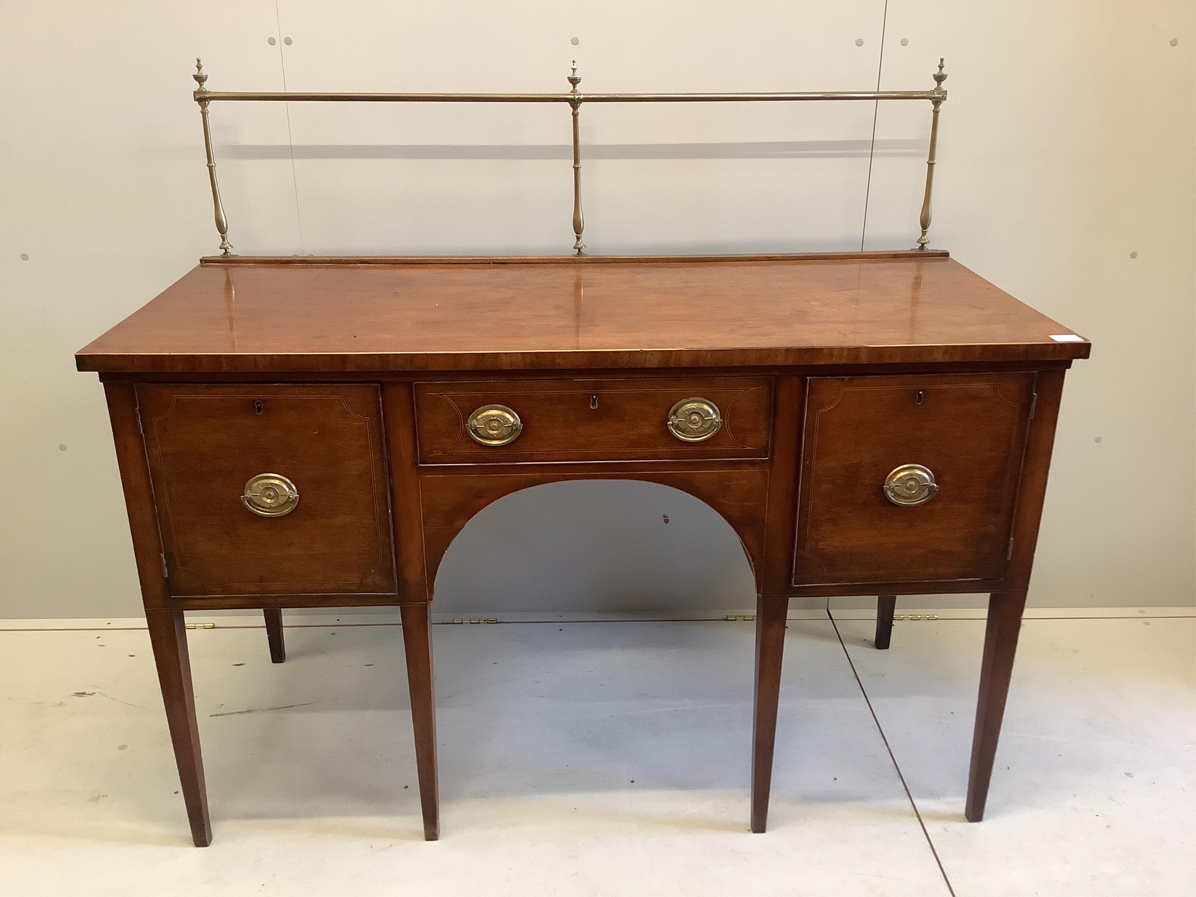 A George III inlaid mahogany sideboard, width 149cm, depth 69cm, height 130cm. Condition - fair